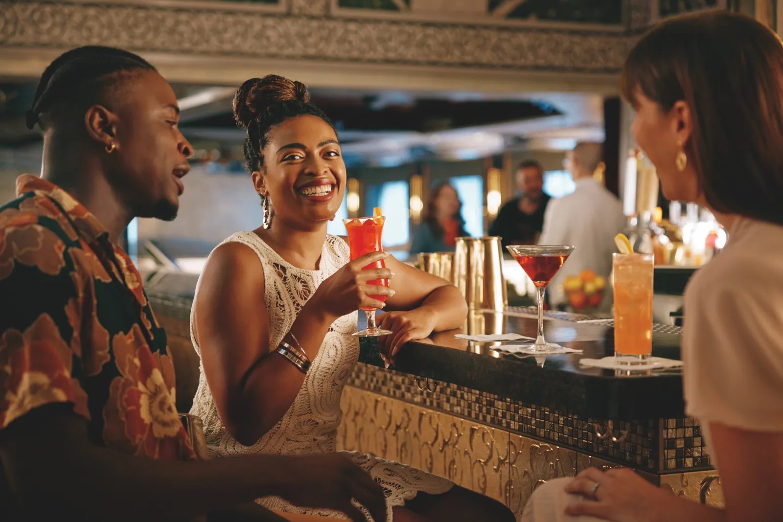 Guests at The Brass Magnolia bar in the French Quarter