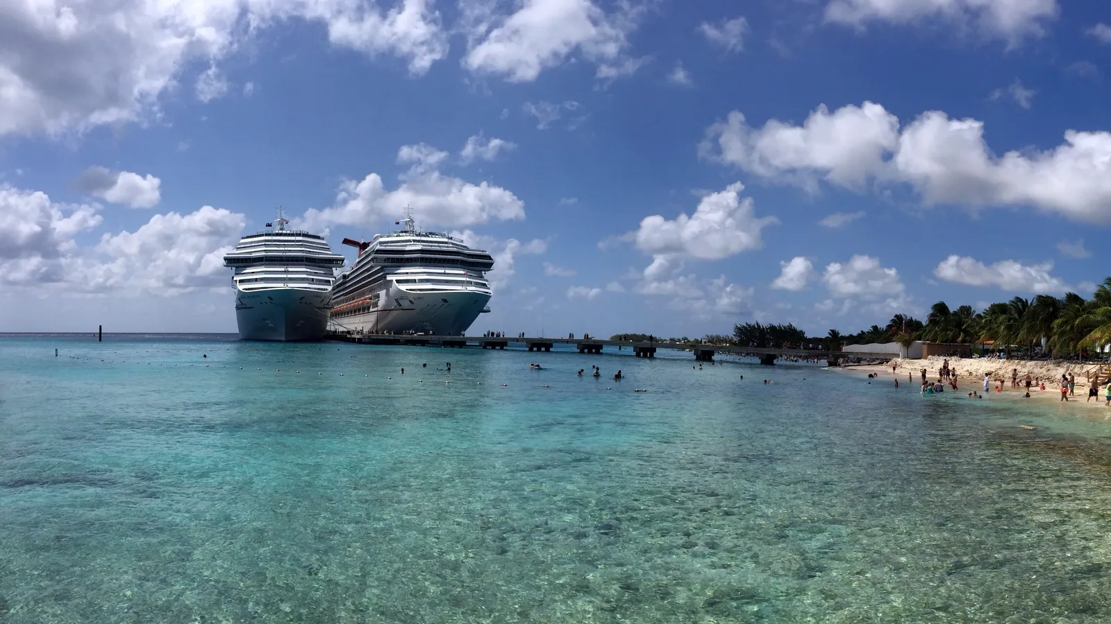 Grand Turk beach with Carnival ships at the cruise center