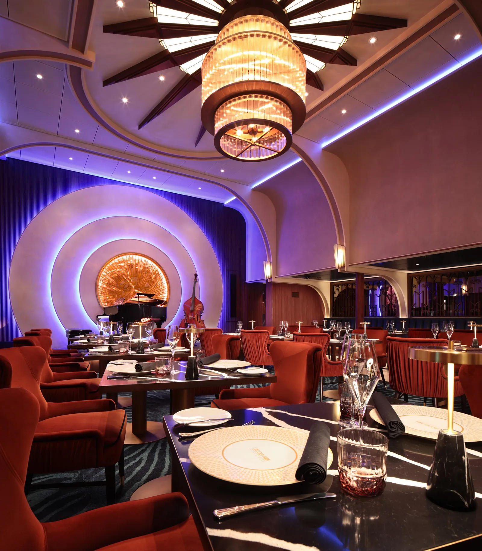 Lincoln Park Supper Club dining room with a stage and piano
