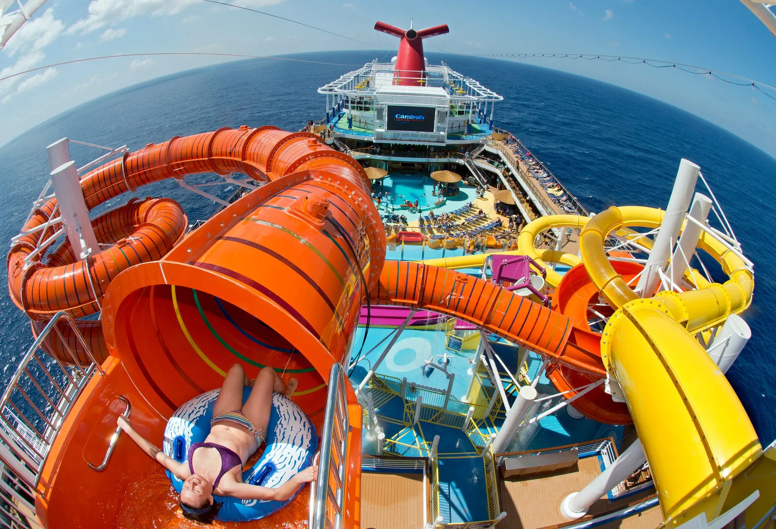 A guest riding Kaleid-O-Slide at WaterWorks on Carnival Vista